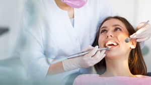 dentist examining a woman